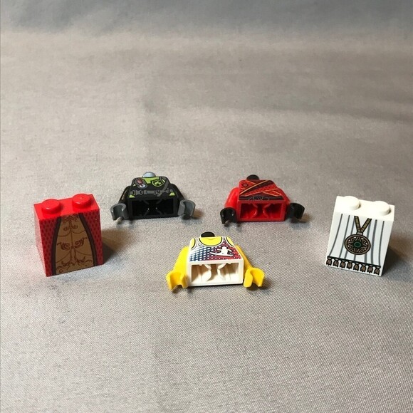 Lego Variety Pieces 3 torso and 2 Leg / Skirt Pieces - Picture 1 of 6